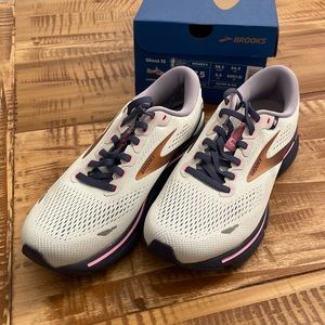 Women’s Brooks Ghost 15. Color Spa blue/neo pink/copper.  Size 7.5. New in box.